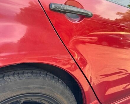 Червоний Міцубісі Lancer, об'ємом двигуна 2 л та пробігом 255 тис. км за 5200 $, фото 3 на Automoto.ua