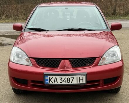 Червоний Міцубісі Lancer, об'ємом двигуна 1.6 л та пробігом 220 тис. км за 4600 $, фото 10 на Automoto.ua