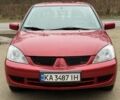 Червоний Міцубісі Lancer, об'ємом двигуна 1.6 л та пробігом 220 тис. км за 4600 $, фото 10 на Automoto.ua