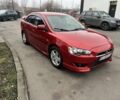 Красный Мицубиси Лансер, объемом двигателя 2 л и пробегом 300 тыс. км за 5700 $, фото 1 на Automoto.ua