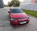 Красный Мицубиси Лансер, объемом двигателя 1.5 л и пробегом 210 тыс. км за 5799 $, фото 8 на Automoto.ua