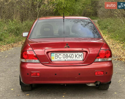 Міцубісі Lancer 2009 у Вінниці на Automoto.ua Червоний Міцубісі Lancer, об'ємом двигуна 1.58 л та пробігом 133 тис. км за 6750 $, фото 10 на Automoto.ua