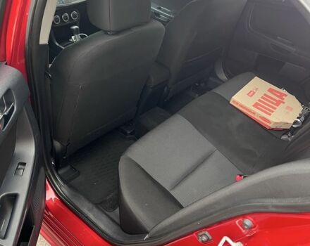 Червоний Міцубісі Lancer, об'ємом двигуна 2 л та пробігом 240 тис. км за 4900 $, фото 5 на Automoto.ua