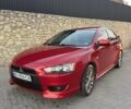 Червоний Міцубісі Lancer, об'ємом двигуна 2 л та пробігом 174 тис. км за 6700 $, фото 1 на Automoto.ua