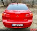 Красный Мицубиси Лансер, объемом двигателя 1.5 л и пробегом 99 тыс. км за 6900 $, фото 1 на Automoto.ua