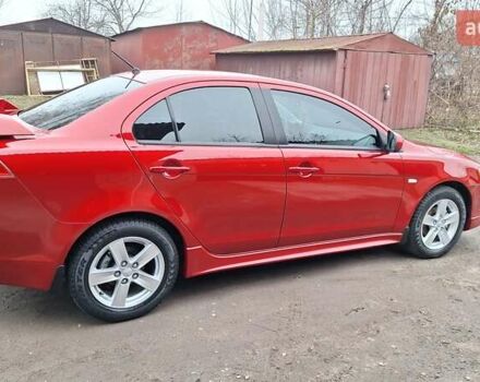 Красный Мицубиси Лансер, объемом двигателя 2 л и пробегом 120 тыс. км за 7800 $, фото 20 на Automoto.ua