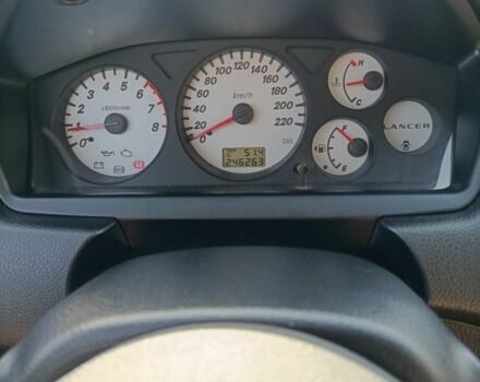 Червоний Міцубісі Lancer, об'ємом двигуна 1.6 л та пробігом 246 тис. км за 5500 $, фото 19 на Automoto.ua