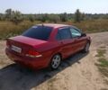 Червоний Міцубісі Lancer, об'ємом двигуна 1.6 л та пробігом 246 тис. км за 5500 $, фото 1 на Automoto.ua