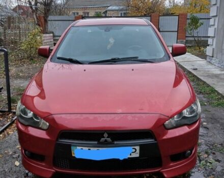 Червоний Міцубісі Lancer, об'ємом двигуна 2 л та пробігом 2 тис. км за 6200 $, фото 1 на Automoto.ua