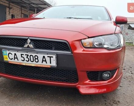 Красный Мицубиси Лансер, объемом двигателя 2 л и пробегом 120 тыс. км за 7800 $, фото 8 на Automoto.ua