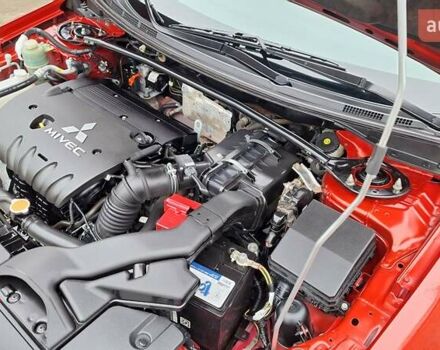 Красный Мицубиси Лансер, объемом двигателя 2 л и пробегом 120 тыс. км за 7800 $, фото 34 на Automoto.ua