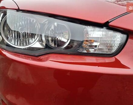 Красный Мицубиси Лансер, объемом двигателя 2 л и пробегом 120 тыс. км за 7800 $, фото 10 на Automoto.ua