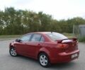 Червоний Міцубісі Lancer, об'ємом двигуна 1 л та пробігом 183 тис. км за 6800 $, фото 1 на Automoto.ua