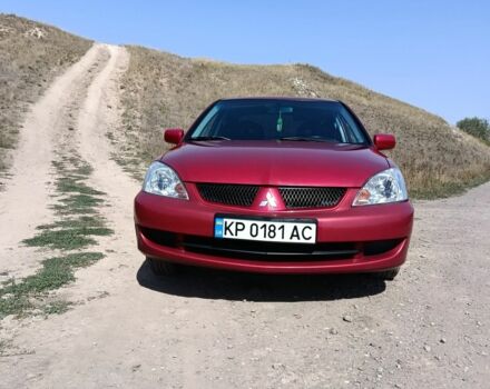 Червоний Міцубісі Lancer, об'ємом двигуна 1.6 л та пробігом 246 тис. км за 5500 $, фото 4 на Automoto.ua
