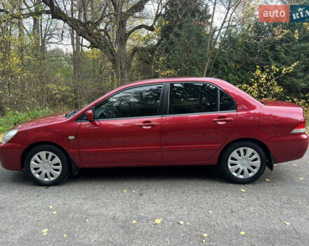 Міцубісі Lancer 2009 у Вінниці на Automoto.ua Червоний Міцубісі Lancer, об'ємом двигуна 1.58 л та пробігом 133 тис. км за 6750 $, фото 12 на Automoto.ua