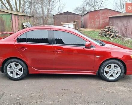 Красный Мицубиси Лансер, объемом двигателя 2 л и пробегом 120 тыс. км за 7800 $, фото 5 на Automoto.ua