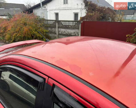 Красный Мицубиси Лансер, объемом двигателя 2 л и пробегом 246 тыс. км за 4900 $, фото 4 на Automoto.ua