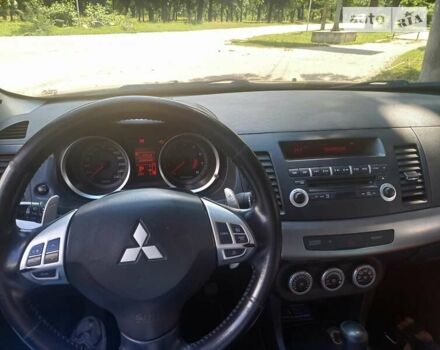 Червоний Міцубісі Lancer, об'ємом двигуна 2 л та пробігом 95 тис. км за 7200 $, фото 11 на Automoto.ua