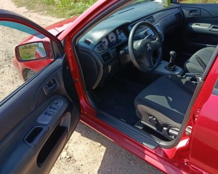 Червоний Міцубісі Lancer, об'ємом двигуна 1.6 л та пробігом 246 тис. км за 5500 $, фото 9 на Automoto.ua