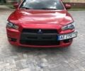 Червоний Міцубісі Lancer, об'ємом двигуна 2 л та пробігом 173 тис. км за 7400 $, фото 1 на Automoto.ua