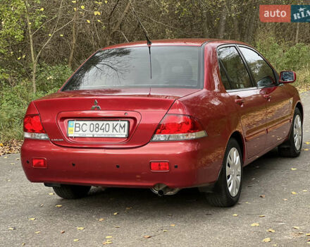 Міцубісі Lancer 2009 у Вінниці на Automoto.ua Червоний Міцубісі Lancer, об'ємом двигуна 1.58 л та пробігом 133 тис. км за 6750 $, фото 9 на Automoto.ua