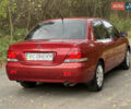 Міцубісі Lancer 2009 у Вінниці на Automoto.ua Червоний Міцубісі Lancer, об'ємом двигуна 1.58 л та пробігом 133 тис. км за 6750 $, фото 9 на Automoto.ua
