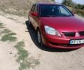 Червоний Міцубісі Lancer, об'ємом двигуна 1.6 л та пробігом 246 тис. км за 5500 $, фото 3 на Automoto.ua