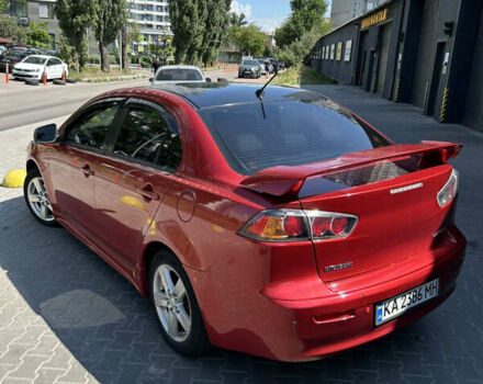 Мицубиси Лансер 2009 в Киеве на Automoto.ua Красный Мицубиси Лансер, объемом двигателя 2 л и пробегом 251 тыс. км за 6999 $, фото 3 на Automoto.ua