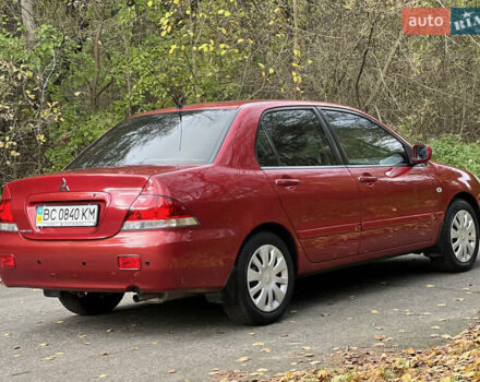 Міцубісі Lancer 2009 у Вінниці на Automoto.ua Червоний Міцубісі Lancer, об'ємом двигуна 1.58 л та пробігом 133 тис. км за 6750 $, фото 8 на Automoto.ua