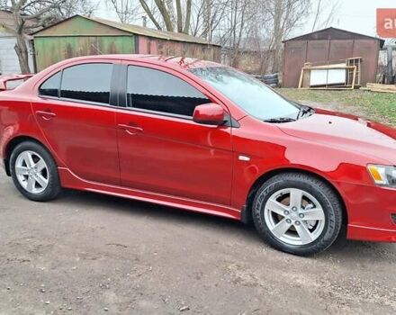 Красный Мицубиси Лансер, объемом двигателя 2 л и пробегом 120 тыс. км за 7800 $, фото 19 на Automoto.ua