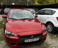 Красный Мицубиси Лансер, объемом двигателя 2 л и пробегом 92 тыс. км за 6500 $, фото 2 на Automoto.ua