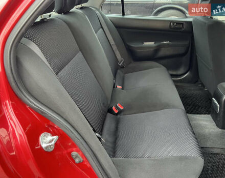 Міцубісі Lancer 2009 у Вінниці на Automoto.ua Червоний Міцубісі Lancer, об'ємом двигуна 1.58 л та пробігом 133 тис. км за 6750 $, фото 31 на Automoto.ua