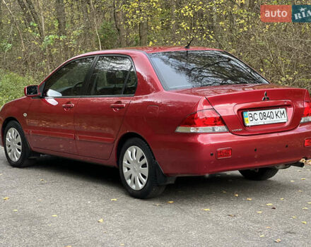 Міцубісі Lancer 2009 у Вінниці на Automoto.ua Червоний Міцубісі Lancer, об'ємом двигуна 1.58 л та пробігом 133 тис. км за 6750 $, фото 11 на Automoto.ua