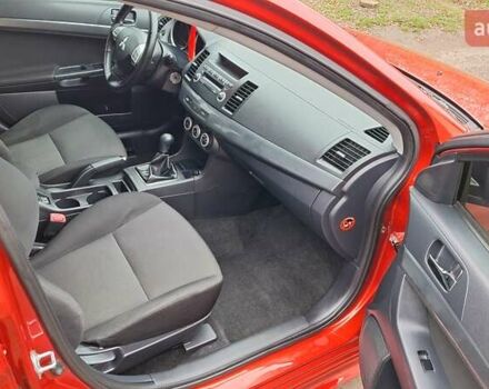 Красный Мицубиси Лансер, объемом двигателя 2 л и пробегом 120 тыс. км за 7800 $, фото 30 на Automoto.ua