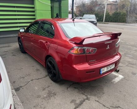 Червоний Міцубісі Lancer, об'ємом двигуна 2 л та пробігом 240 тис. км за 4900 $, фото 3 на Automoto.ua