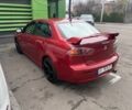 Червоний Міцубісі Lancer, об'ємом двигуна 2 л та пробігом 240 тис. км за 4900 $, фото 3 на Automoto.ua