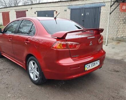 Красный Мицубиси Лансер, объемом двигателя 2 л и пробегом 120 тыс. км за 7800 $, фото 2 на Automoto.ua