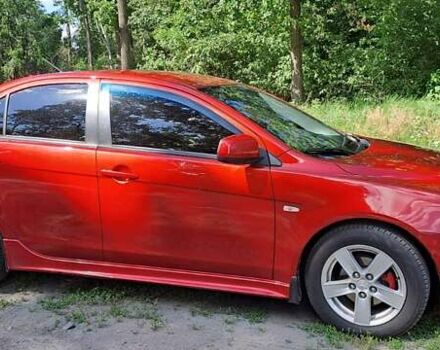Червоний Міцубісі Lancer, об'ємом двигуна 2 л та пробігом 197 тис. км за 7300 $, фото 1 на Automoto.ua