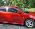 Червоний Міцубісі Lancer, об'ємом двигуна 2 л та пробігом 197 тис. км за 7300 $, фото 1 на Automoto.ua