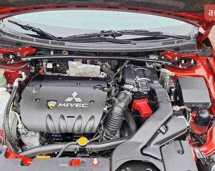 Красный Мицубиси Лансер, объемом двигателя 2 л и пробегом 120 тыс. км за 7800 $, фото 32 на Automoto.ua