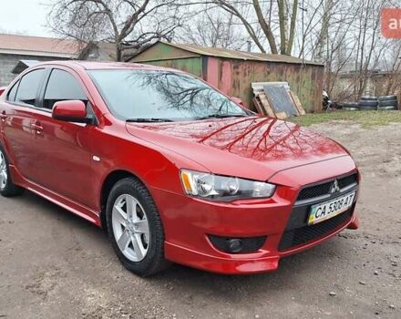 Красный Мицубиси Лансер, объемом двигателя 2 л и пробегом 120 тыс. км за 7800 $, фото 6 на Automoto.ua