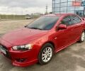 Красный Мицубиси Лансер, объемом двигателя 2 л и пробегом 91 тыс. км за 10000 $, фото 8 на Automoto.ua