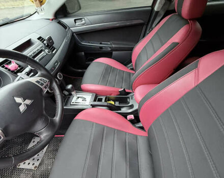 Красный Мицубиси Лансер, объемом двигателя 2 л и пробегом 170 тыс. км за 6300 $, фото 5 на Automoto.ua