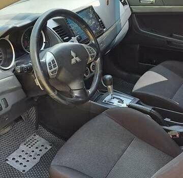 Червоний Міцубісі Lancer, об'ємом двигуна 2 л та пробігом 197 тис. км за 7300 $, фото 5 на Automoto.ua