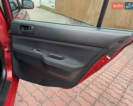 Міцубісі Lancer 2009 у Вінниці на Automoto.ua Червоний Міцубісі Lancer, об'ємом двигуна 1.58 л та пробігом 133 тис. км за 6750 $, фото 25 на Automoto.ua