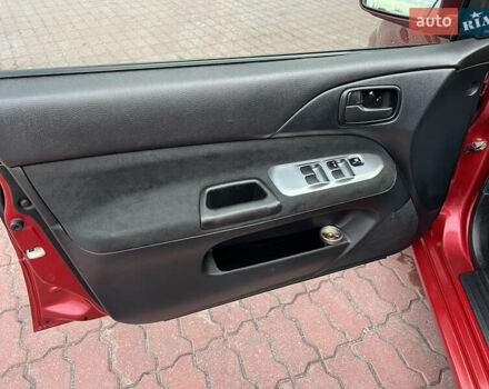 Міцубісі Lancer 2009 у Вінниці на Automoto.ua Червоний Міцубісі Lancer, об'ємом двигуна 1.58 л та пробігом 133 тис. км за 6750 $, фото 46 на Automoto.ua