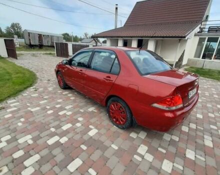 Красный Мицубиси Лансер, объемом двигателя 1.6 л и пробегом 127 тыс. км за 4700 $, фото 4 на Automoto.ua