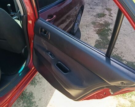 Червоний Міцубісі Lancer, об'ємом двигуна 1.6 л та пробігом 246 тис. км за 5500 $, фото 15 на Automoto.ua