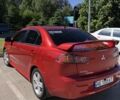 Червоний Міцубісі Lancer, об'ємом двигуна 2 л та пробігом 207 тис. км за 7500 $, фото 1 на Automoto.ua