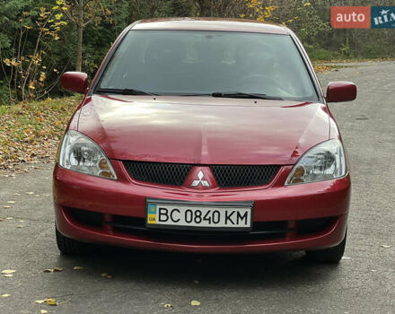 Міцубісі Lancer 2009 у Вінниці на Automoto.ua Червоний Міцубісі Lancer, об'ємом двигуна 1.58 л та пробігом 133 тис. км за 6750 $, фото 1 на Automoto.ua